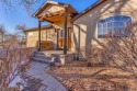 Enter thru a private courtyard into a spacious entryway adorned for sale in Pueblo West Colorado Pueblo County County on GolfHomes.com