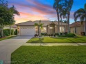This Captivating home offers a bright Airy open floor plan with for sale in Lake Worth Florida Palm Beach County County on GolfHomes.com