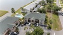 Discover a pristine upper-level, furnished corner condo nestled for sale in Punta Gorda Florida Charlotte County County on GolfHomes.com