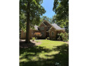 This beautiful brick home is nestled along the 14th hole of for sale in Chatsworth Georgia Murray County County on GolfHomes.com