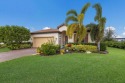 This pristine pool home located in The Links at Rosedale exudes for sale in Bradenton Florida Manatee County County on GolfHomes.com