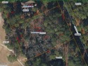 Be impressed by this beautiful wooded lot with almost 200 feet for sale in Pinehurst North Carolina Moore County County on GolfHomes.com