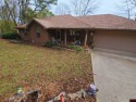 All Brick 3 bed 2 bath home backing to the old White River Golf for sale in Bull Shoals Arkansas Marion County County on GolfHomes.com