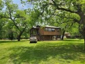 Wonderful chance to live or vacation one road off of the Brazos for sale in Weatherford Texas Parker County County on GolfHomes.com