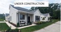 Welcome to the Cottages at Plum Brook. New Findlay Deluxe floor for sale in Huron Ohio Erie County County on GolfHomes.com
