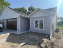 This NEW construction twin-home along Hole #9 fairway of Emerald for sale in Arnolds Park Iowa Dickinson County County on GolfHomes.com
