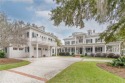 Welcome to 33 Old Oak where the Lowcountry meets this stately for sale in Bluffton South Carolina Beaufort County County on GolfHomes.com