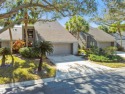 Welcome to your new sanctuary--a charming four-bedroom for sale in Clearwater Florida Pinellas County County on GolfHomes.com