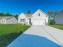 This beautiful 4-bedroom, 3-bath home features a fantastic open for sale in Richmond Hill Georgia Bryan County County on GolfHomes.com