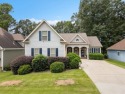 Resort-style living starts here! This master-on-main beauty sits for sale in Newnan Georgia Coweta County County on GolfHomes.com