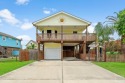 This home in sought after Sea Isle has a large living- dinning for sale in Fulshear Texas Fort Bend County County on GolfHomes.com