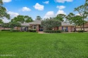 This stunning brick pool home was Glen Reynolds model for Hidden for sale in Jacksonville Florida Duval County County on GolfHomes.com
