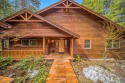 BREATHTAKING VIEWS OF THE LAKE and mountains can be enjoyed from for sale in Lake Almanor California Plumas County County on GolfHomes.com