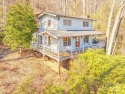 Cute as a button cozy cottage in Maggie Valley!  This well for sale in Maggie Valley North Carolina Haywood County County on GolfHomes.com