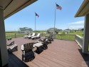 This spectacular beach home with an abundance of living space for sale in Crystal Beach Texas Galveston County County on GolfHomes.com