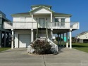 This cozy 3 bedroom, 2 bath is located in one of Crystal Beach's for sale in Crystal Beach Texas Galveston County County on GolfHomes.com