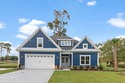 This brand new Riptide home with stunning setting and finishes for sale in Sunset Beach North Carolina Brunswick County County on GolfHomes.com