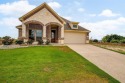 Beautiful new home on the golf course that is now move-in ready! for sale in Benbrook Texas Tarrant County County on GolfHomes.com