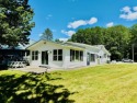 MOTIVATED SELLER...LAKE JAMES WATERFRONT!  This lakefront home for sale in Prudenville Michigan Roscommon County County on GolfHomes.com