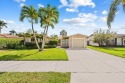 TOTALLY REMODELED 3/2 WITH 1 CAR GARAGE LOCATED RIGHT ACROSS THE for sale in Hollywood Florida Broward County County on GolfHomes.com