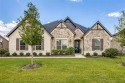 This beautiful one-story home is located in a stunning golf for sale in Gunter Texas Grayson County County on GolfHomes.com