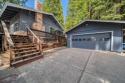 This charming 3 bedroom 2 bathroom mountain home is the perfect for sale in Lake Almanor California Plumas County County on GolfHomes.com
