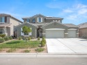 Welcome to this stunning 2-story home in the exclusive gated for sale in Dinuba California Tulare County County on GolfHomes.com