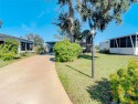 CHARMING, UNIQUE, MOBILE HOME IN FABULOUS HOLIDAY PARK, A for sale in North Port Florida Sarasota County County on GolfHomes.com