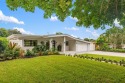 Stunning 4-bed, 3-bath home in the Country Club Estates for sale in Plantation Florida Broward County County on GolfHomes.com