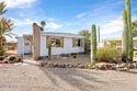 Discover comfort and style in this beautiful, furnished home for sale in Tucson Arizona Pima County County on GolfHomes.com