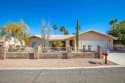 Outstanding Custom Mesa Del Sol property overlooking the golf for sale in Yuma Arizona Yuma County County on GolfHomes.com