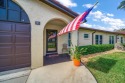 This impeccably updated 2-bedroom, 2-bathroom contemporary for sale in Largo Florida Pinellas County County on GolfHomes.com