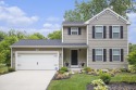 Welcome to this spacious 4-bedroom, 2.5-bath set on nearly half for sale in Plainwell Michigan Allegan County County on GolfHomes.com