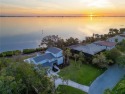 Welcome to 3804 Bayside Drive! Situated directly on Sarasota Bay for sale in Bradenton Florida Manatee County County on GolfHomes.com