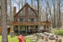 Golfers paradise! 5BR/3bth Chalet featuring ample living space for sale in Greentown Pennsylvania Pike County County on GolfHomes.com