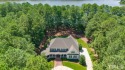 Introducing a stunning and stately home nestled on a 1.18-acre for sale in Holly Springs North Carolina Wake County County on GolfHomes.com