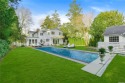 Step into casual charm at 178 South Country Road, nestled in the for sale in Bellport New York Suffolk County County on GolfHomes.com