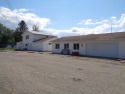 Prime Commercial Property offering the largest space available for sale in Houghton Lake Michigan Roscommon County County on GolfHomes.com