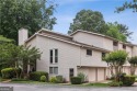 Spacious and full of potential, this end-unit townhome in the for sale in Marietta Georgia Cobb County County on GolfHomes.com