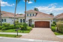 Enjoy tranquil lake views and sunrises from your 3-bed, 2-bath for sale in Naples Florida Collier County County on GolfHomes.com