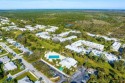 Extra Extra....this condo is calling your name.  Two bedrooms for sale in Jupiter Florida Martin County County on GolfHomes.com