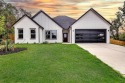 Welcome to your dream home in Runaway Bay, where tranquility for sale in Runaway Bay Texas Wise County County on GolfHomes.com