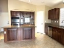 Welcome to this beautiful 3 bedroom plus Den home in Rancho El for sale in Maricopa Arizona Pinal County County on GolfHomes.com