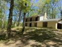 Renovations have begun on this 2-story diamond in the rough for sale in Saltillo Mississippi Lee County County on GolfHomes.com