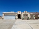 Situated gracefully between the 11th and 12th holes of the for sale in Fort Mohave Arizona Mohave County County on GolfHomes.com