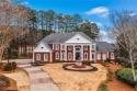 Elegant estate on the best lot in Windward. Privacy, peace, and for sale in Alpharetta Georgia Fulton County County on GolfHomes.com