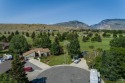 Situated on the ninth hole of the Olive Glenn Golf Course, 10 for sale in Cody Wyoming Park County County on GolfHomes.com
