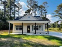 WHITE PLAINS SCHOOLS- Welcome to this stunning custom-built home for sale in Anniston Alabama Calhoun County County on GolfHomes.com