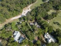 Overlooking the 9th hole of Palmetto Bluff's May River golf for sale in Bluffton South Carolina Beaufort County County on GolfHomes.com