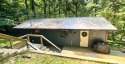 Beautifully updated 3 bed/3 bath cabin in Hide-A-Way Hills for sale in Hideaway Hills Ohio Hocking County County on GolfHomes.com
